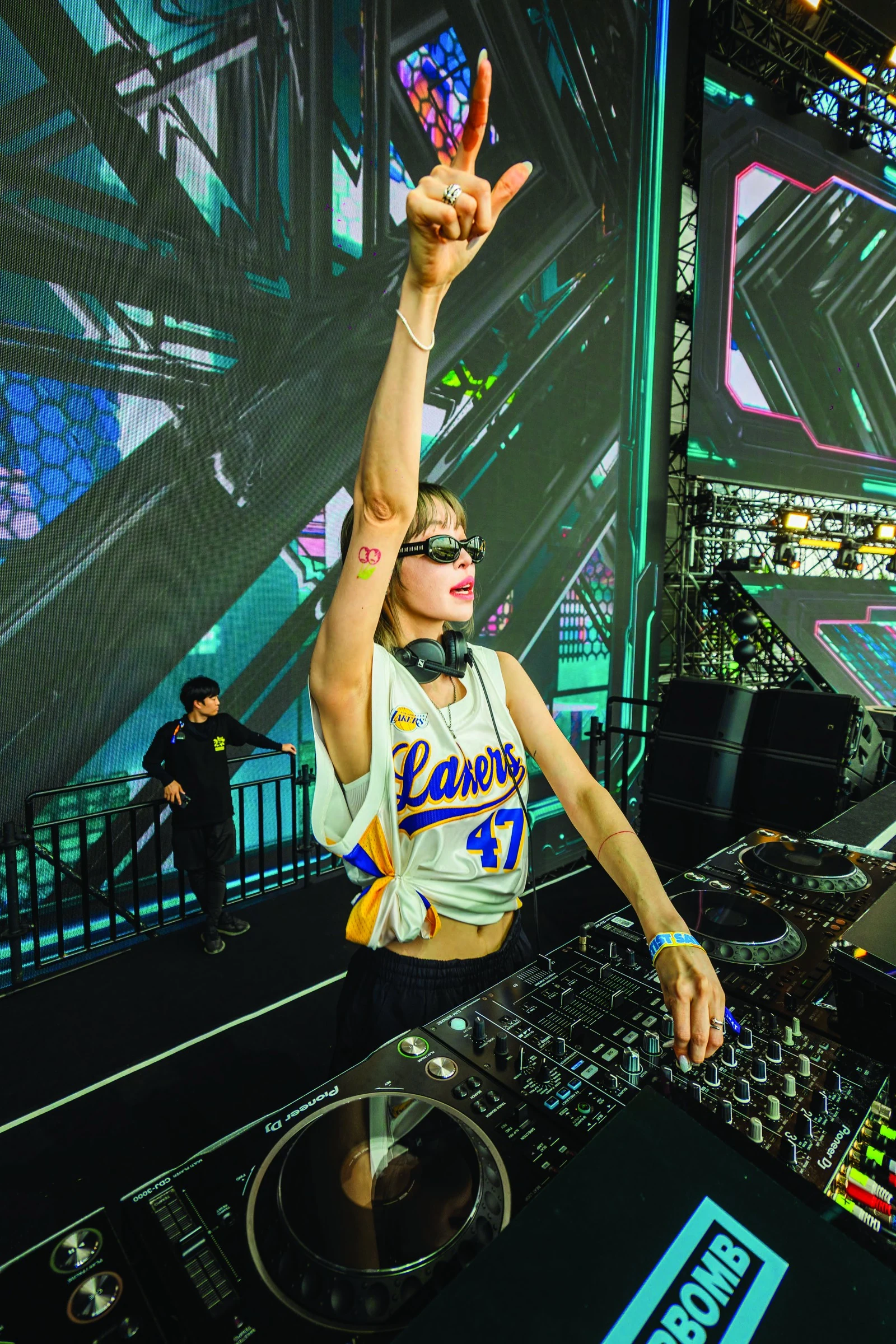 YOONI raising her hand at Waterbomb Seoul 2025